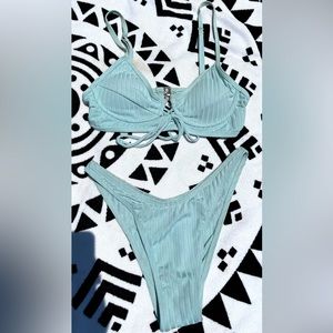 Small, two piece bikini, adjustable straps, high rise bottoms :)